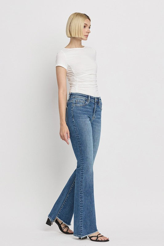 High Rise Slant Hem Flared Jeans