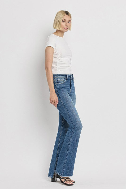 High Rise Slant Hem Flared Jeans