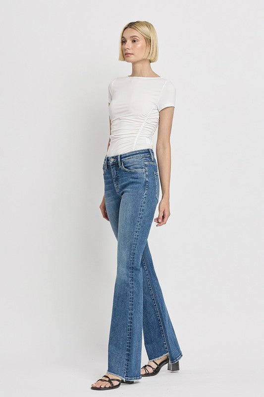 High Rise Slant Hem Flared Jeans