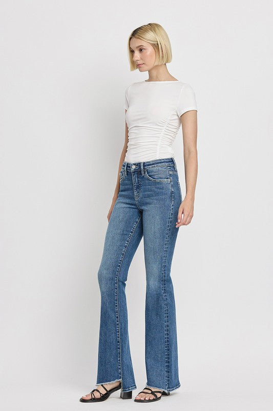 High Rise Slant Hem Flared Jeans