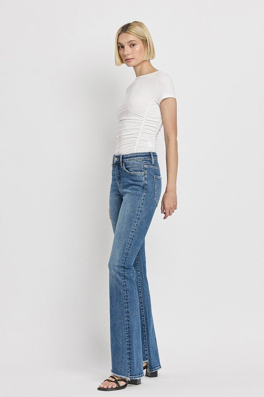 High Rise Slant Hem Flared Jeans