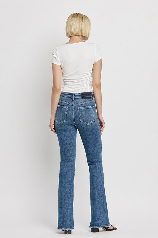 High Rise Slant Hem Flared Jeans